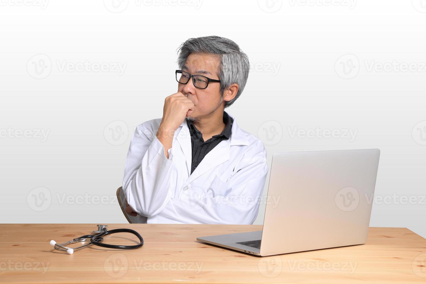 Asian Man Sitting photo