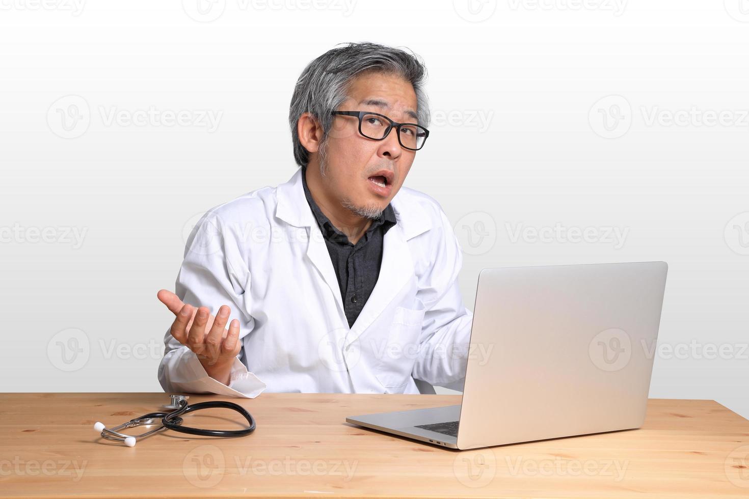 Asian Man Sitting photo