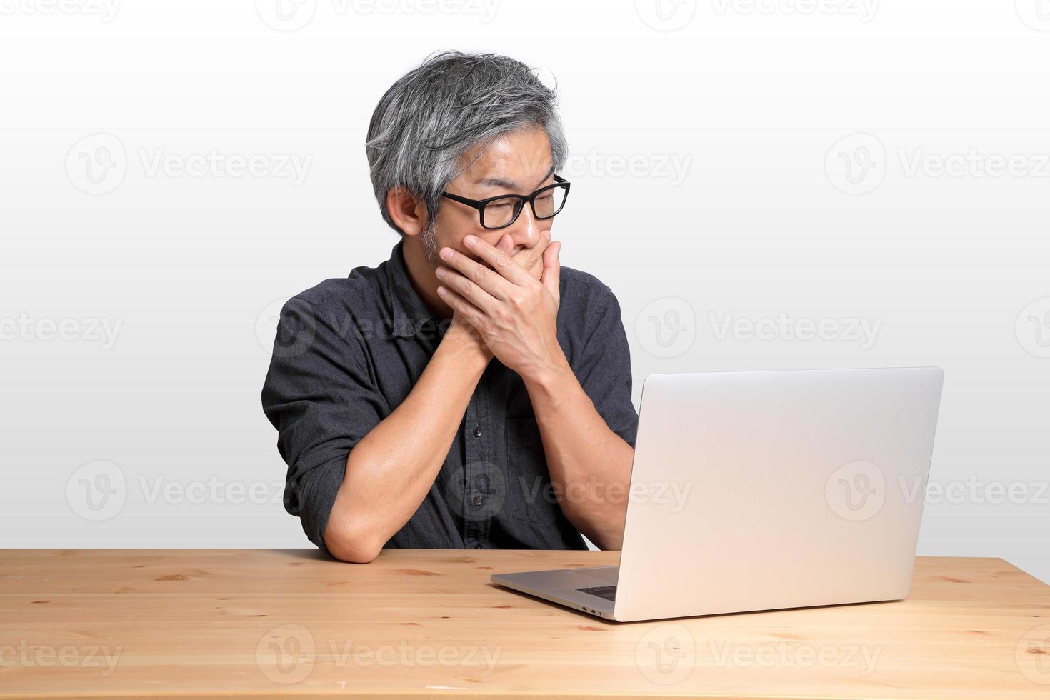 Asian Man Sitting photo