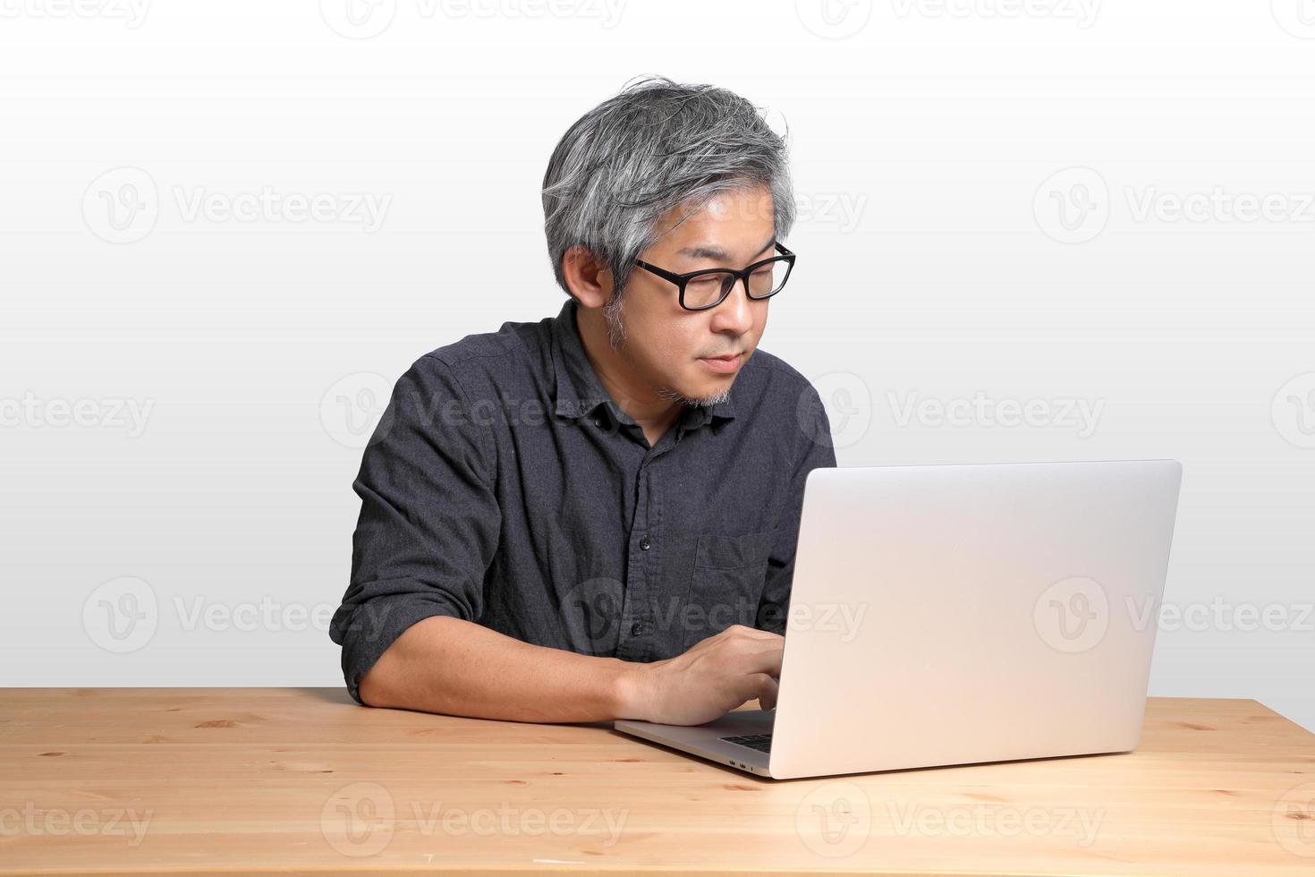 Asian Man Sitting photo