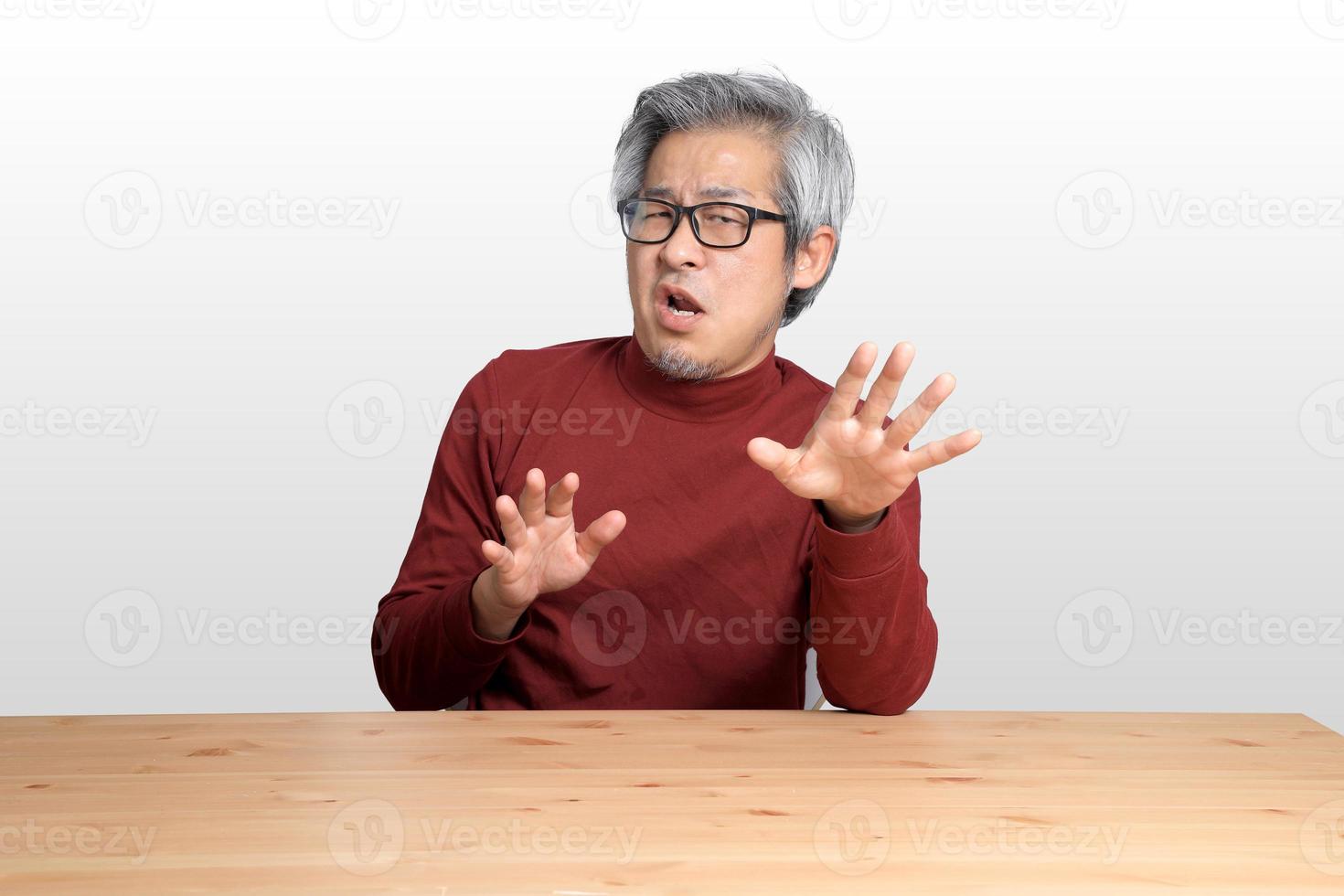 Asian Man at the Desk photo