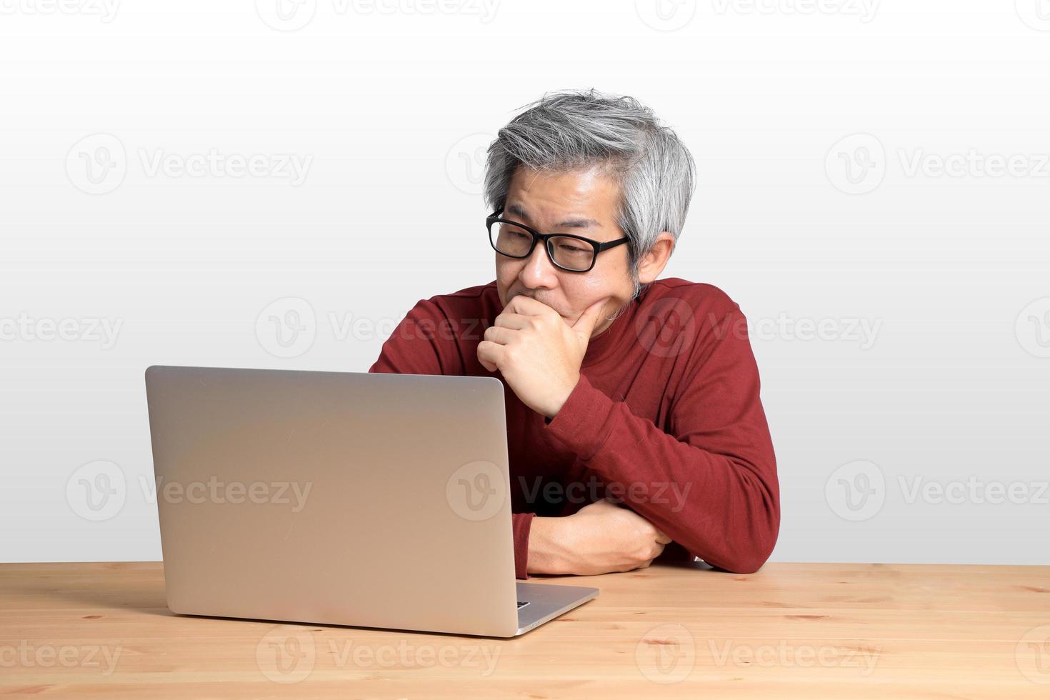 Asian Man at the Desk photo