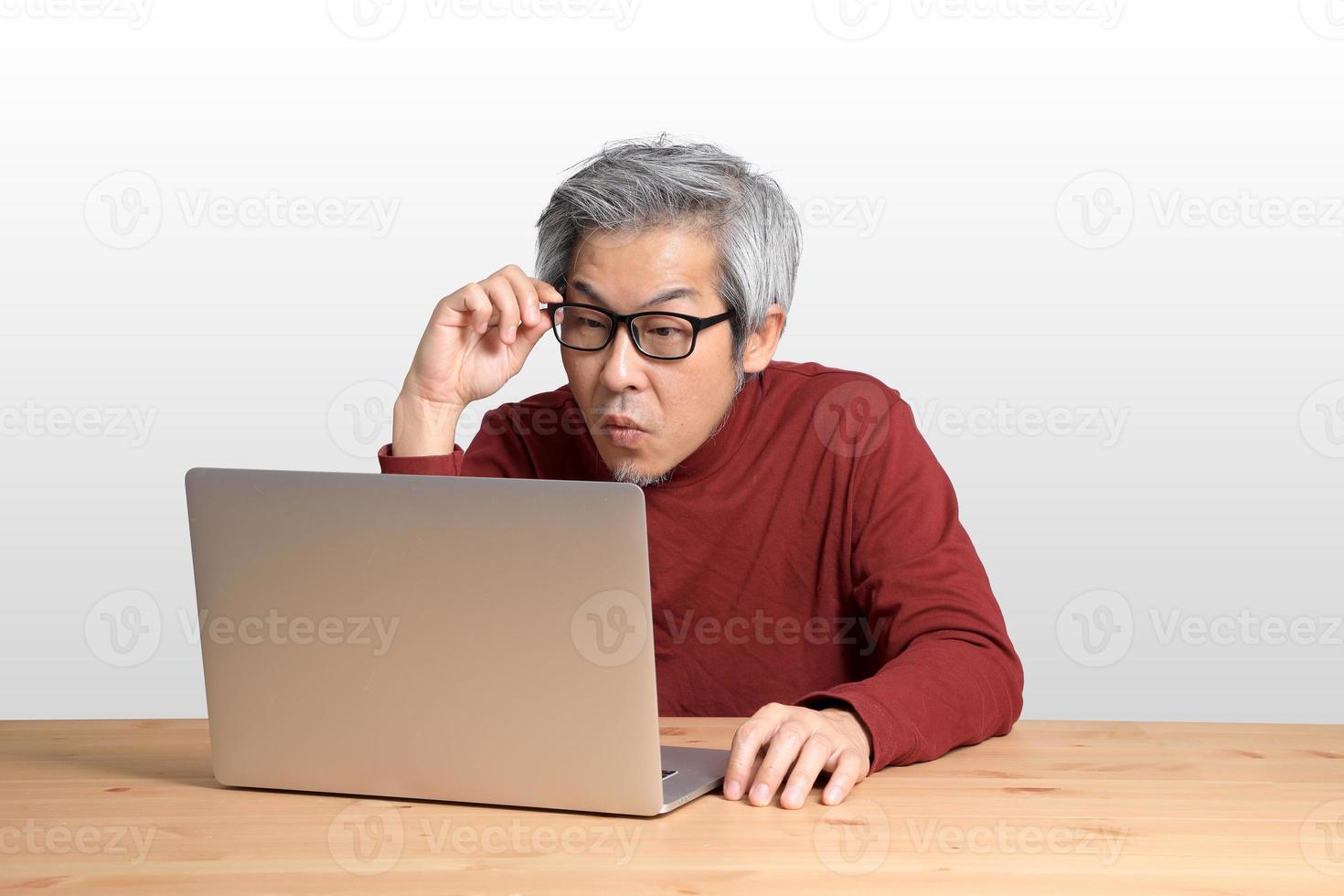 Asian Man at the Desk photo