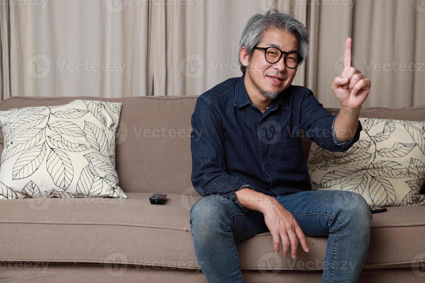 Asian Man in The Living Room photo