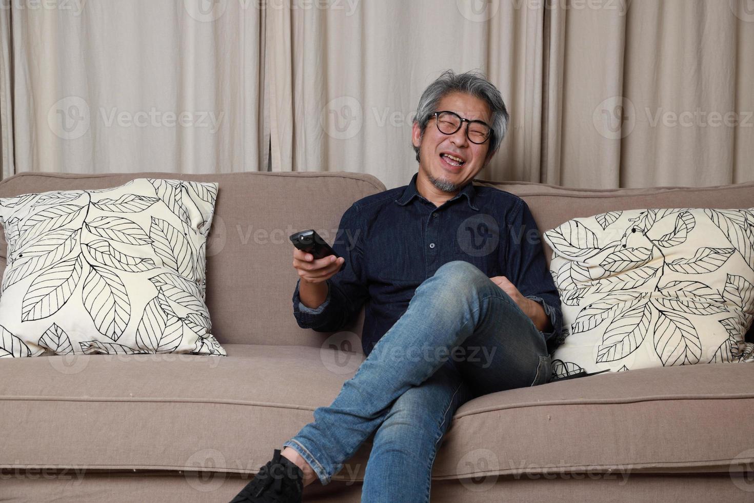 Asian Man in The Living Room photo