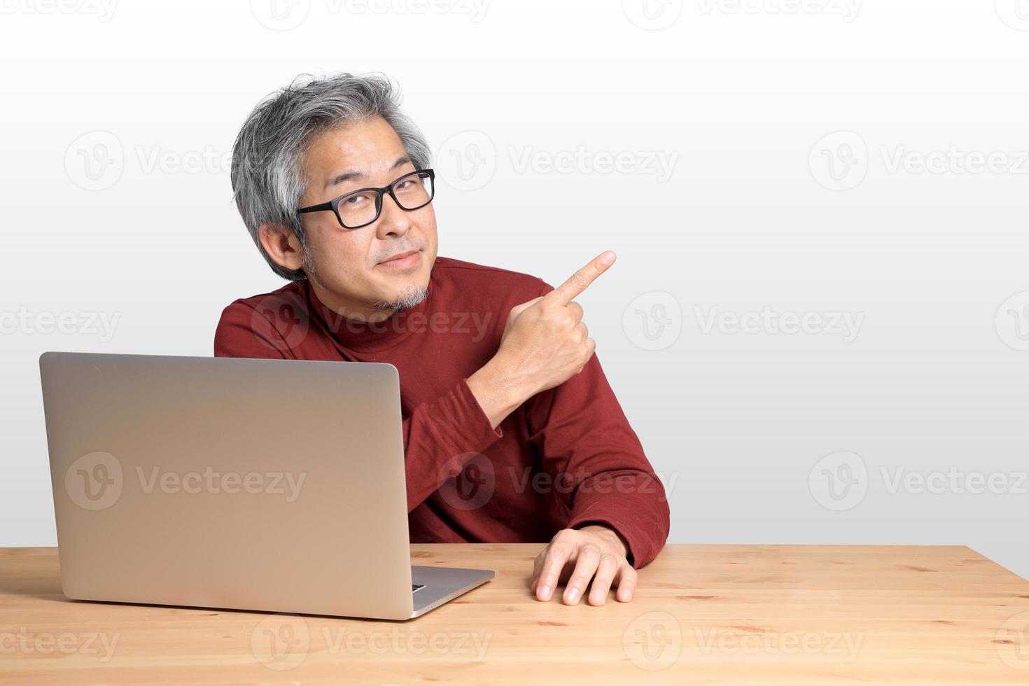 Asian Man Sitting photo