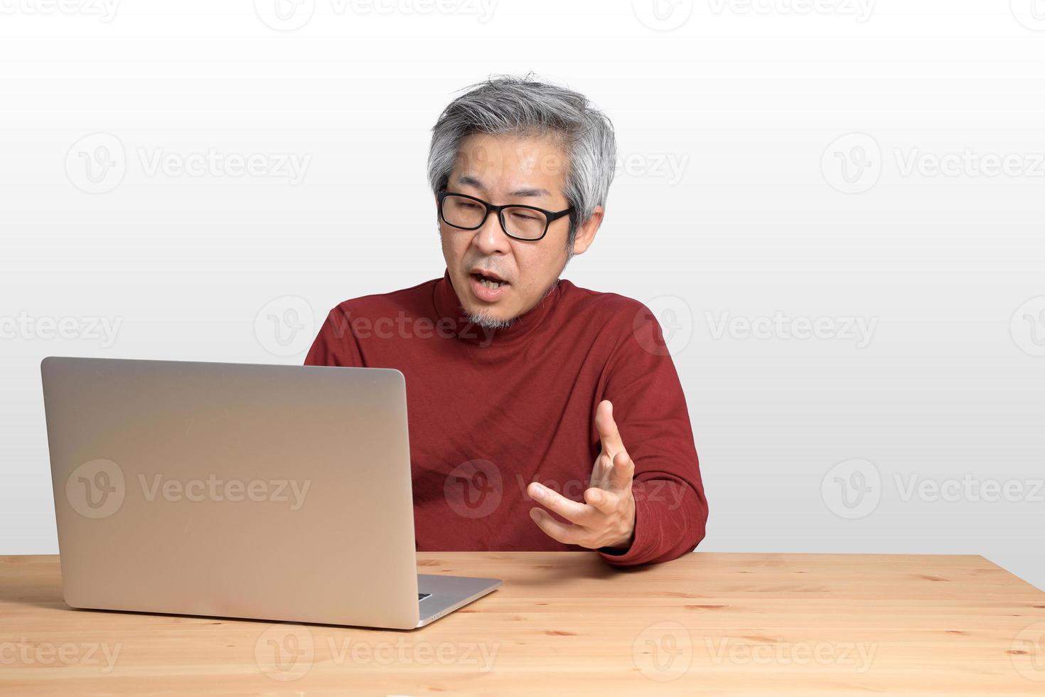 Asian Man Sitting photo