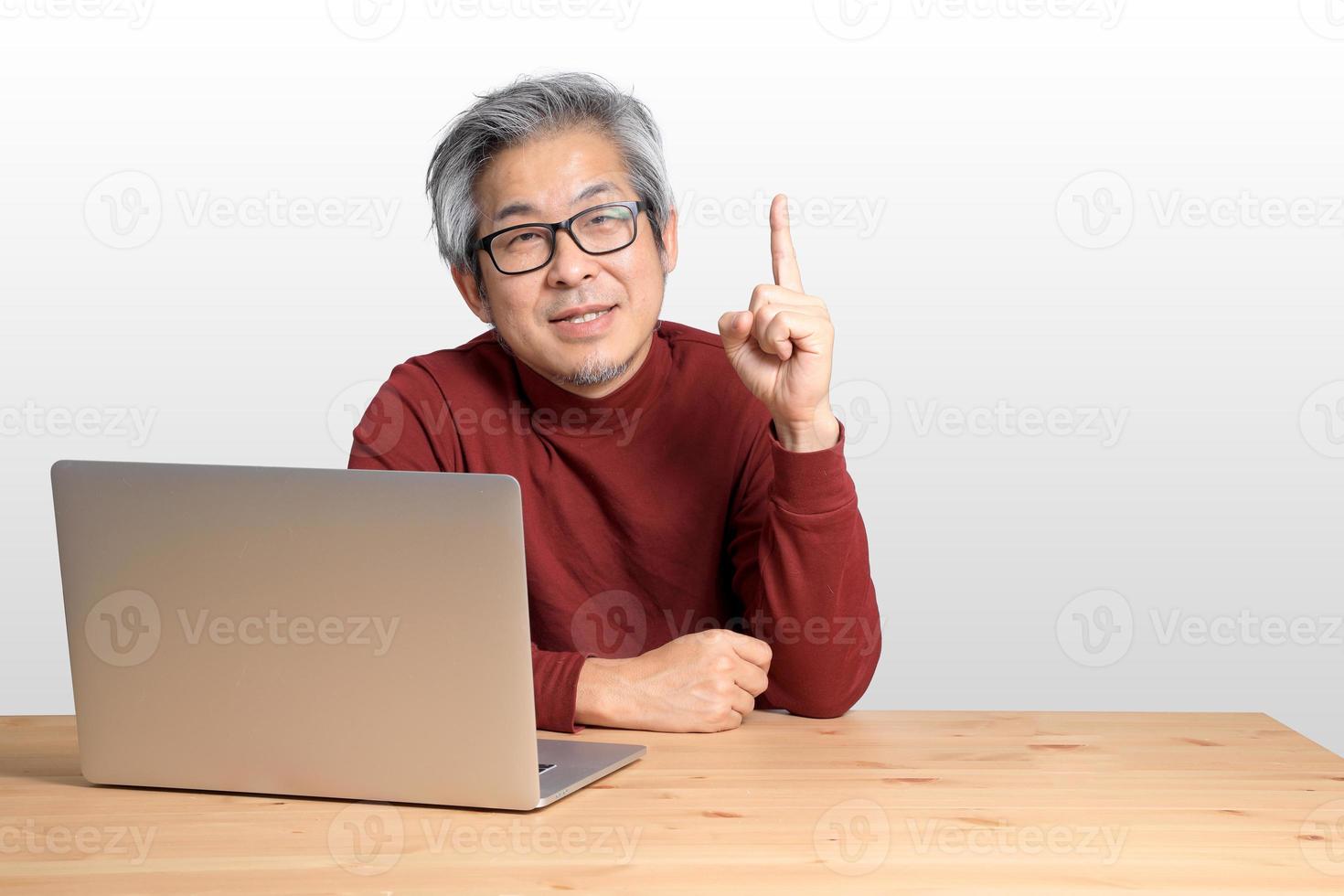 Asian Man Sitting photo