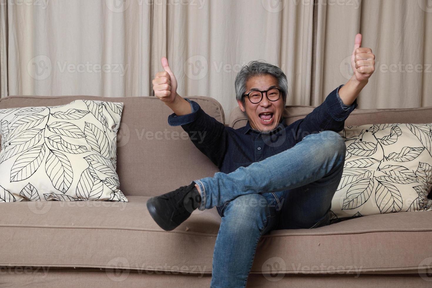 Asian Man in The Living Room photo