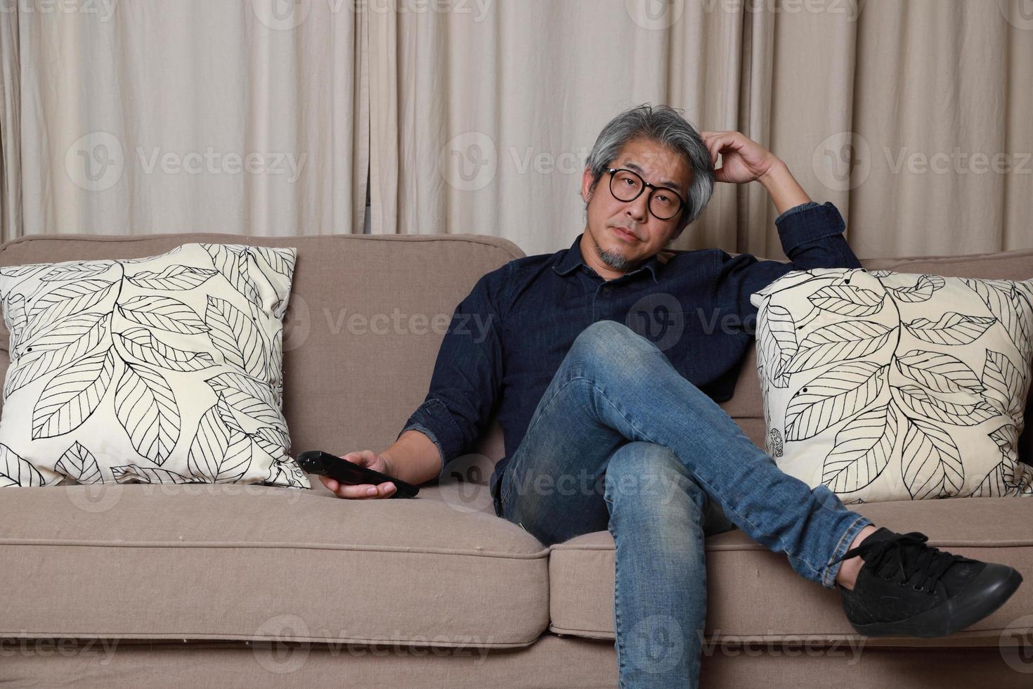 Asian Man in The Living Room photo