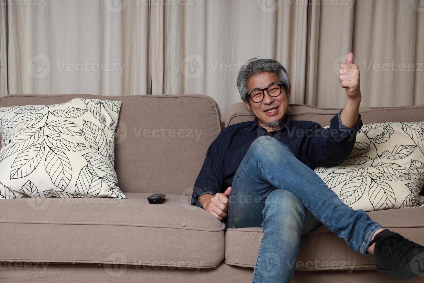 Asian Man in The Living Room photo