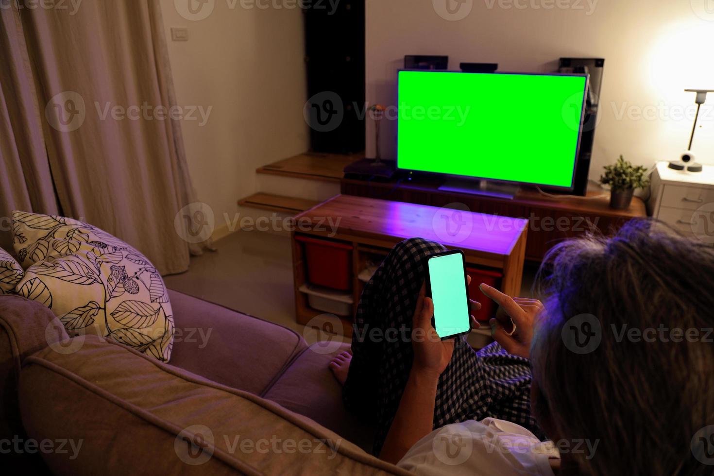 Asian Man Watching Television photo