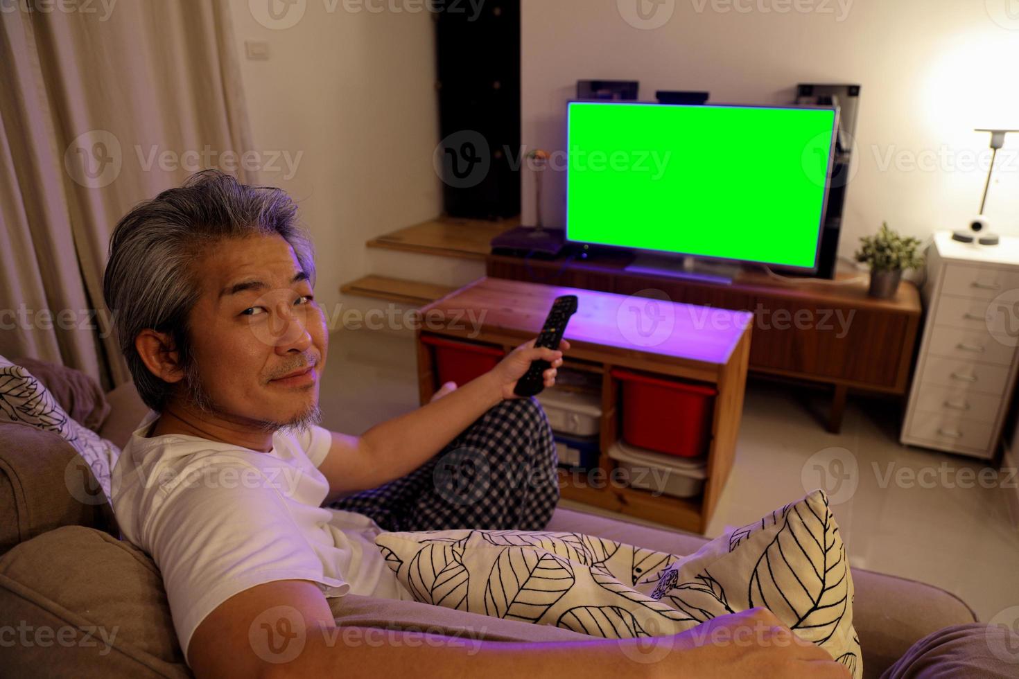 Asian Man Watching Television photo