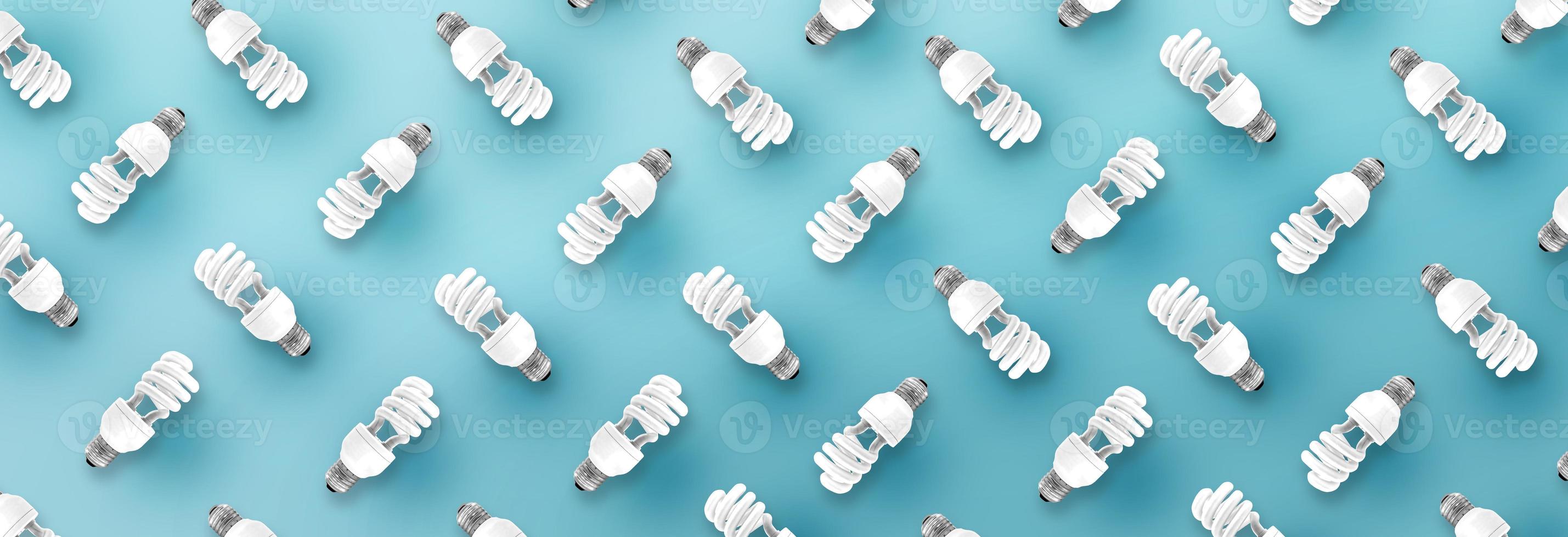 Fluorescent Light Bulb pattern on blue background. photo
