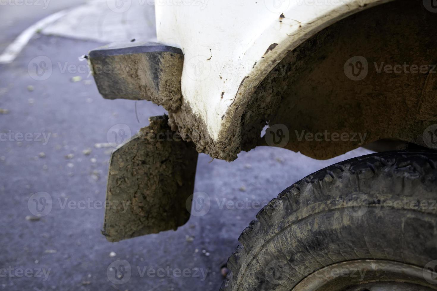 Muddy car wheels photo