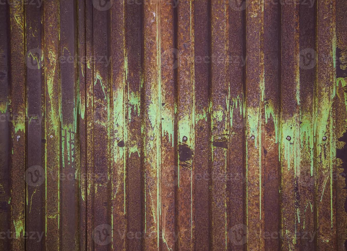 Rust texture on metal wall photo