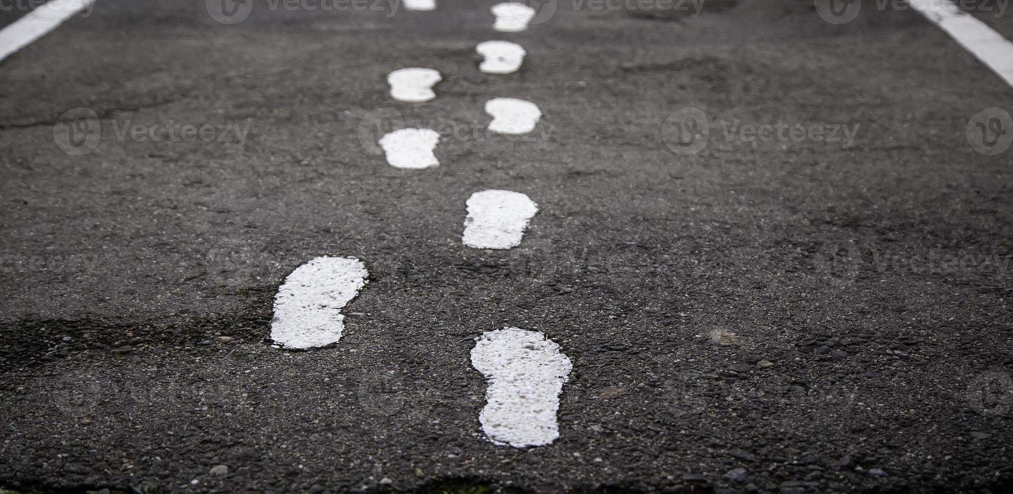 Footprints on street photo