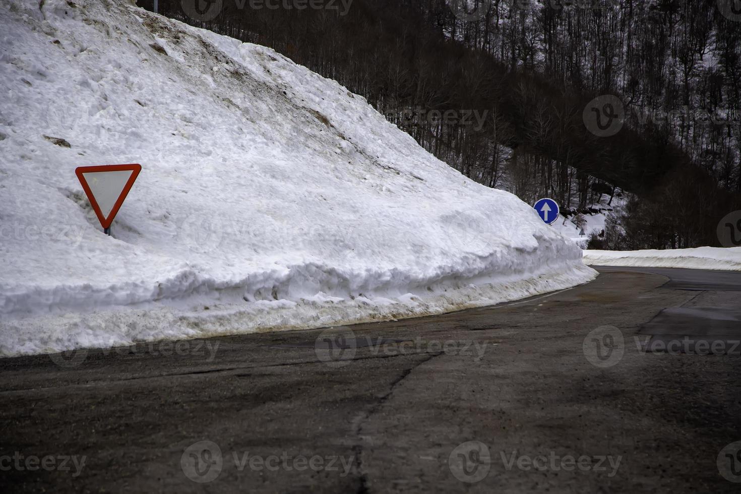 Snowy road mountains photo