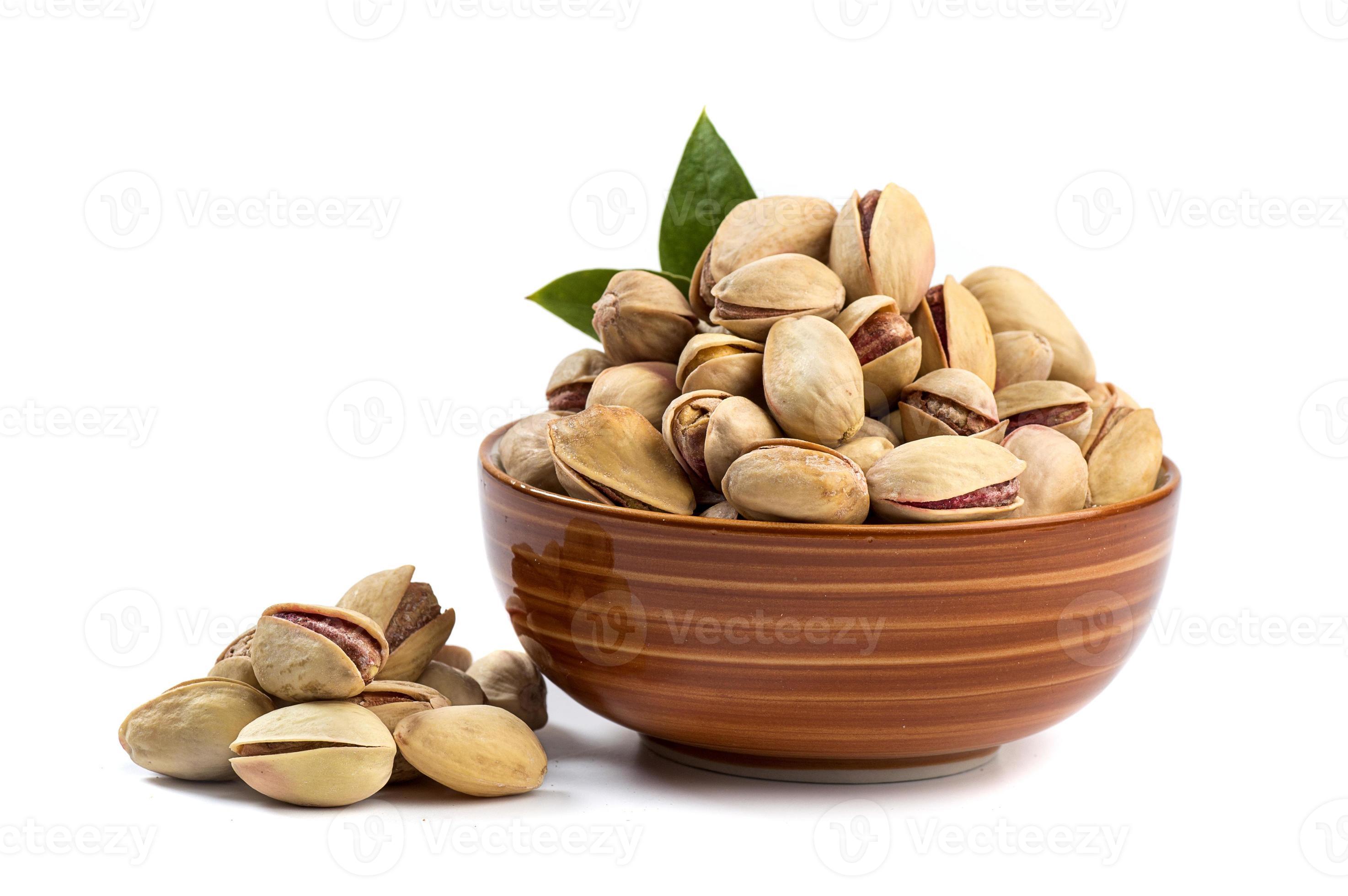 https://static.vecteezy.com/system/resources/previews/002/859/120/large_2x/pistachio-in-bowl-on-white-background-photo.jpg