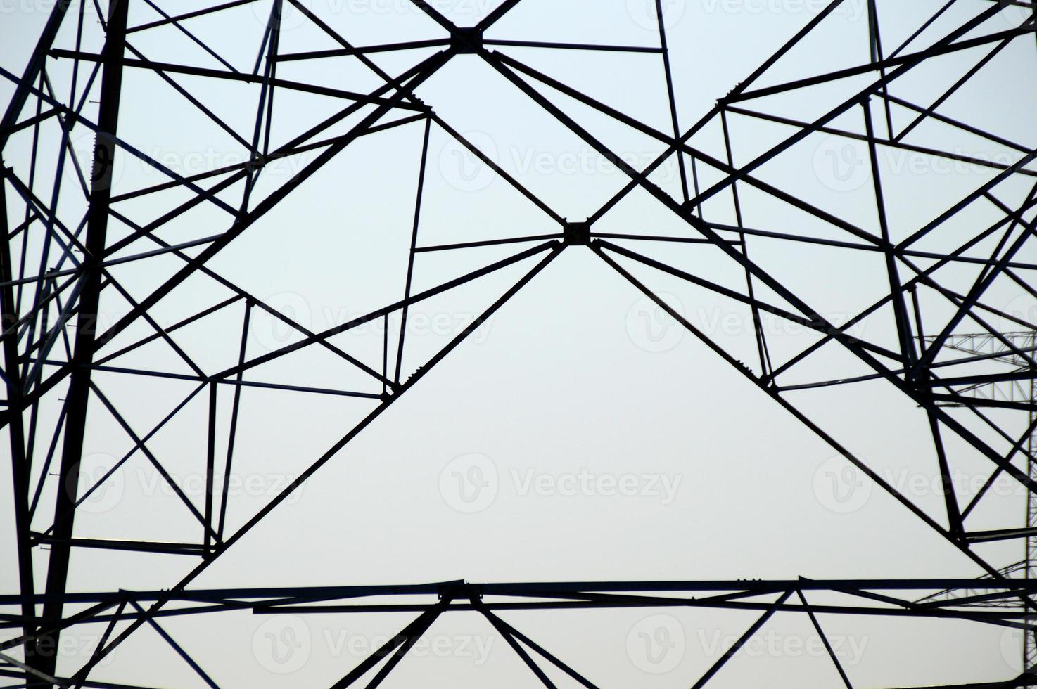 high voltage post,High voltage tower on blue sky background. photo