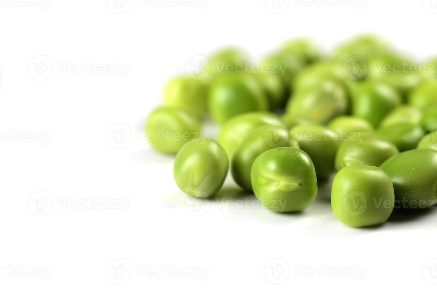 Fresh Green Pea in white plate on white background photo