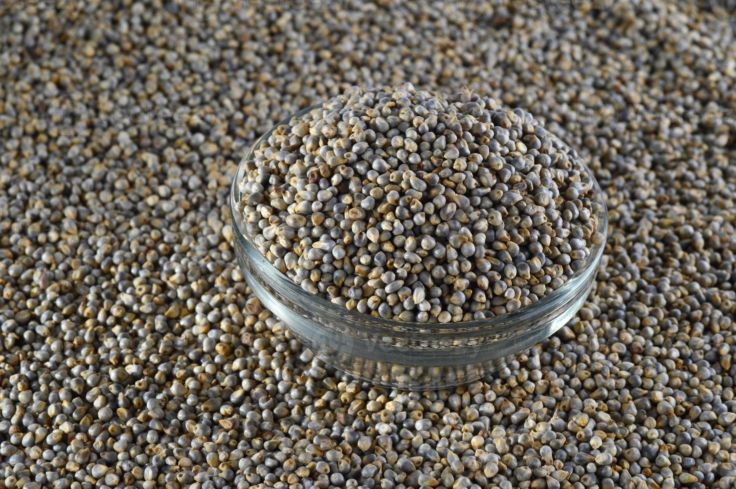 Bajra, Pearl millet in glass bowl photo