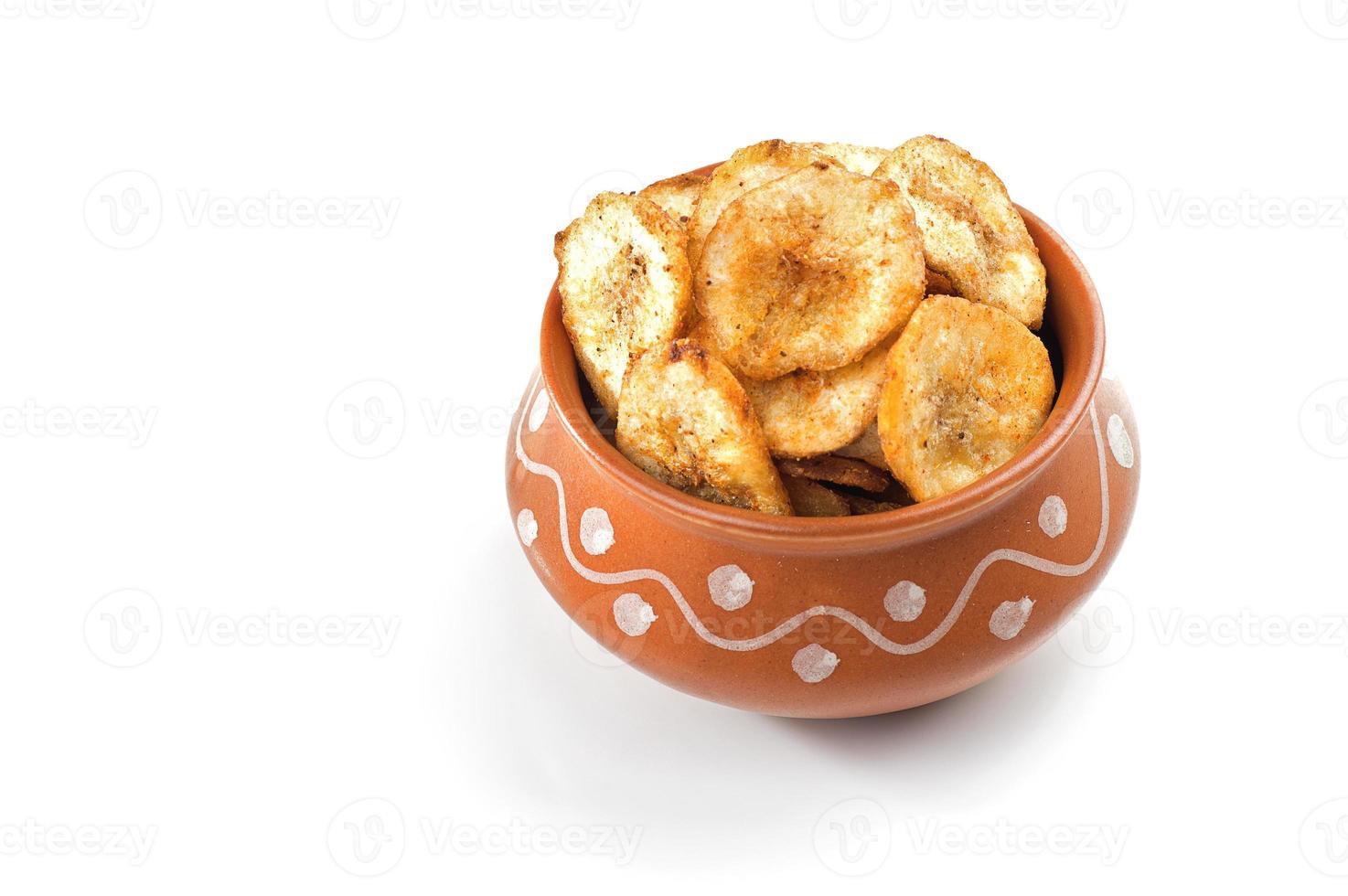 Banana chips on a white background photo