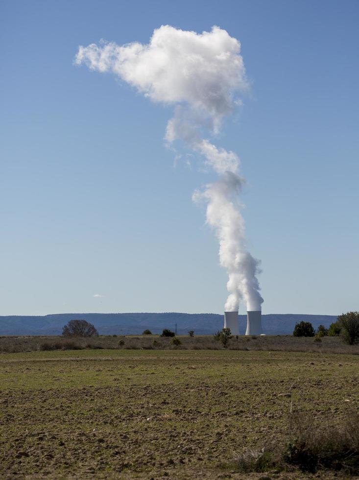 Smoking chimneys of a nuclear power plant in the province of Guadalajara, Castilla La Mancha, Spain photo