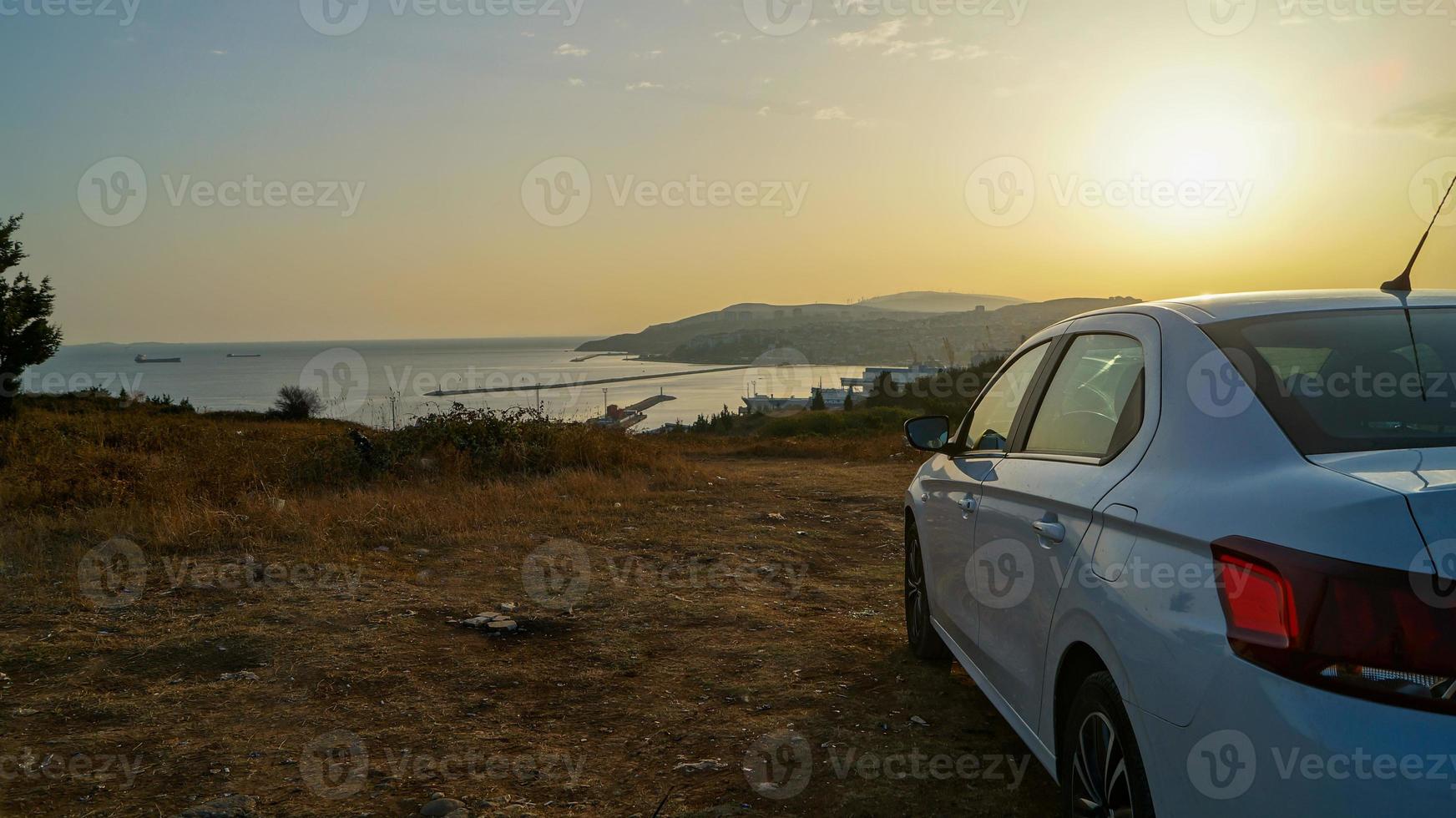 Car meeting the sunrise photo