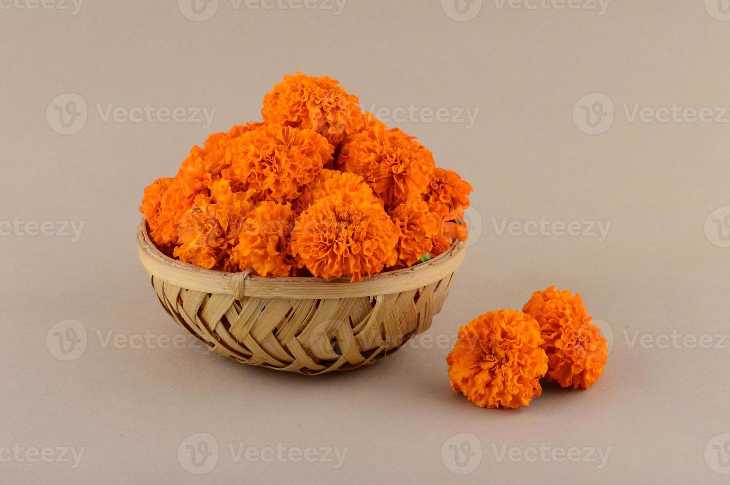 Marigold Zendu Flowers flowers in a bamboo basket. 2864145 Stock Photo