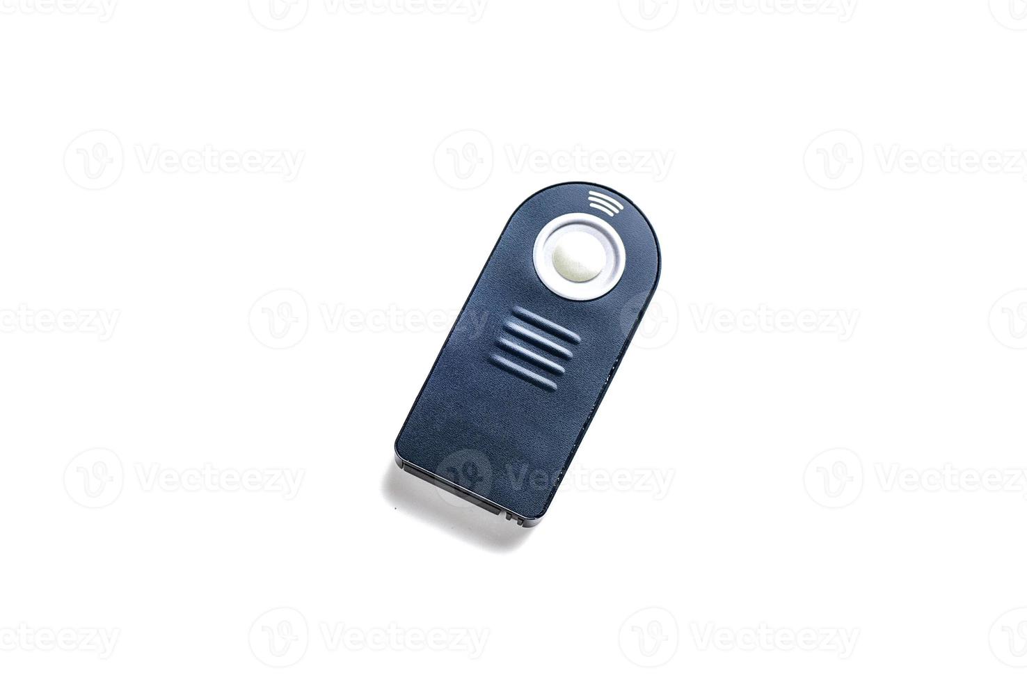 Wireless Remote control for DSLR camera. Isolated on white background photo