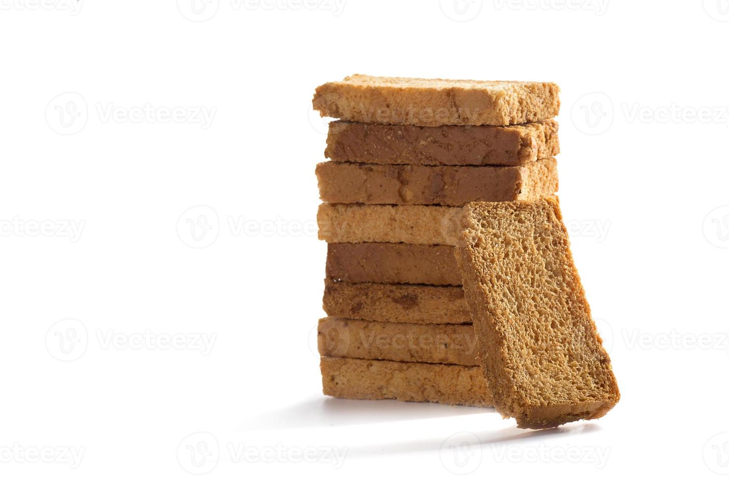 Rusk or toasts on a white background photo