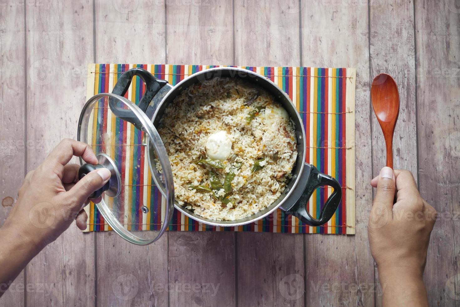 mutton biryani meal in a bowl on table. photo