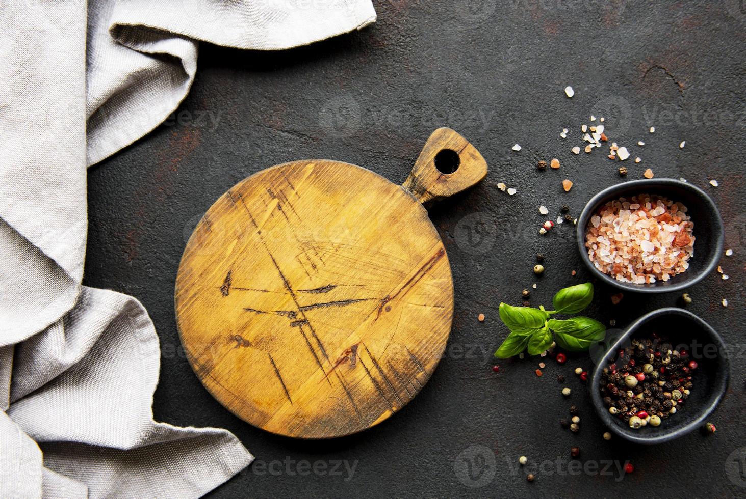 Chopping board and seasonings photo