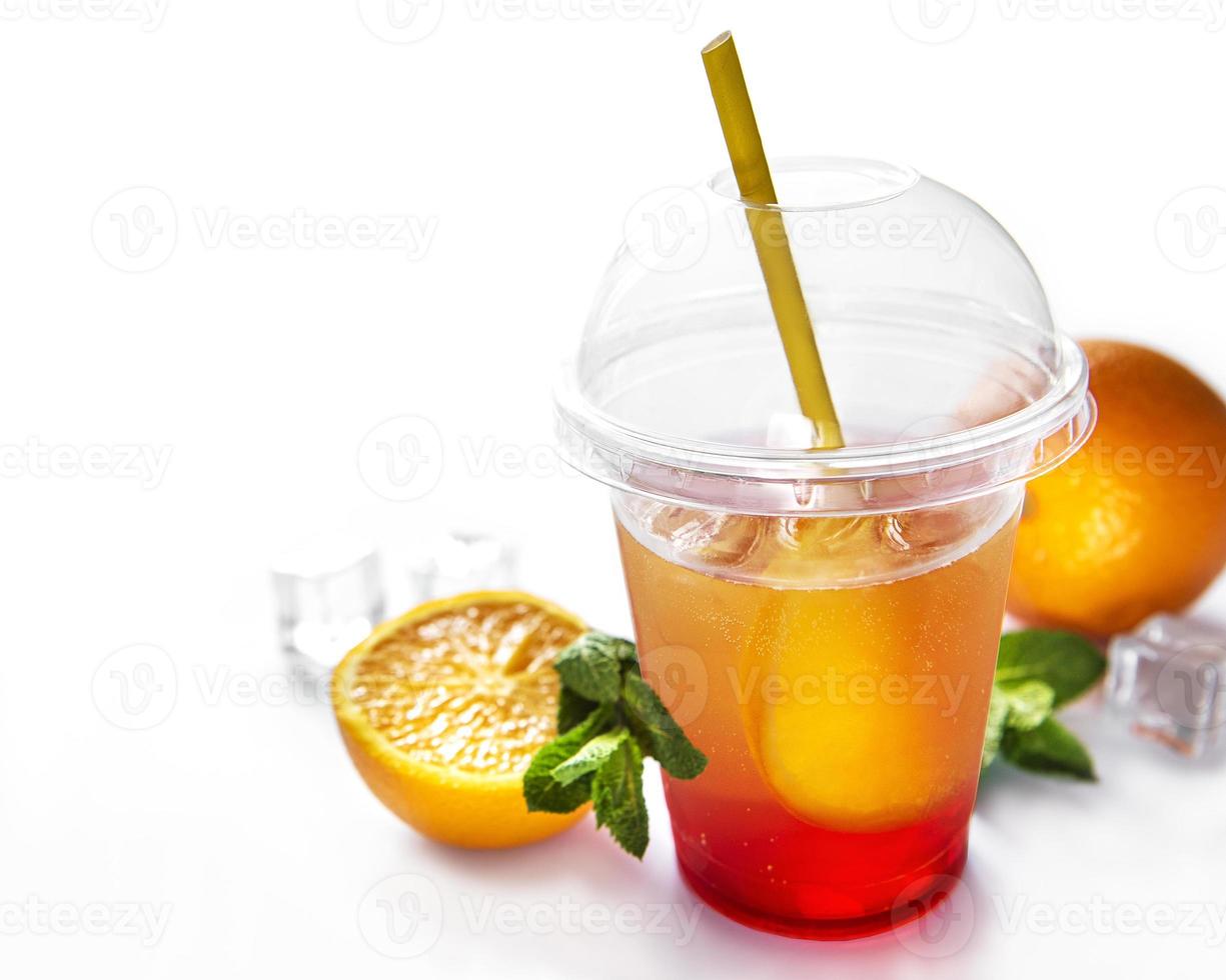 Fresh cocktail with orange and ice photo
