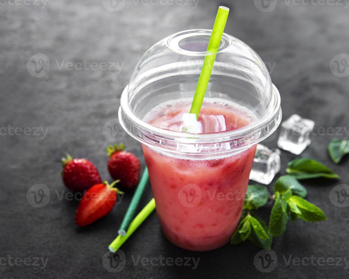 Refreshing summer drink with strawberry photo