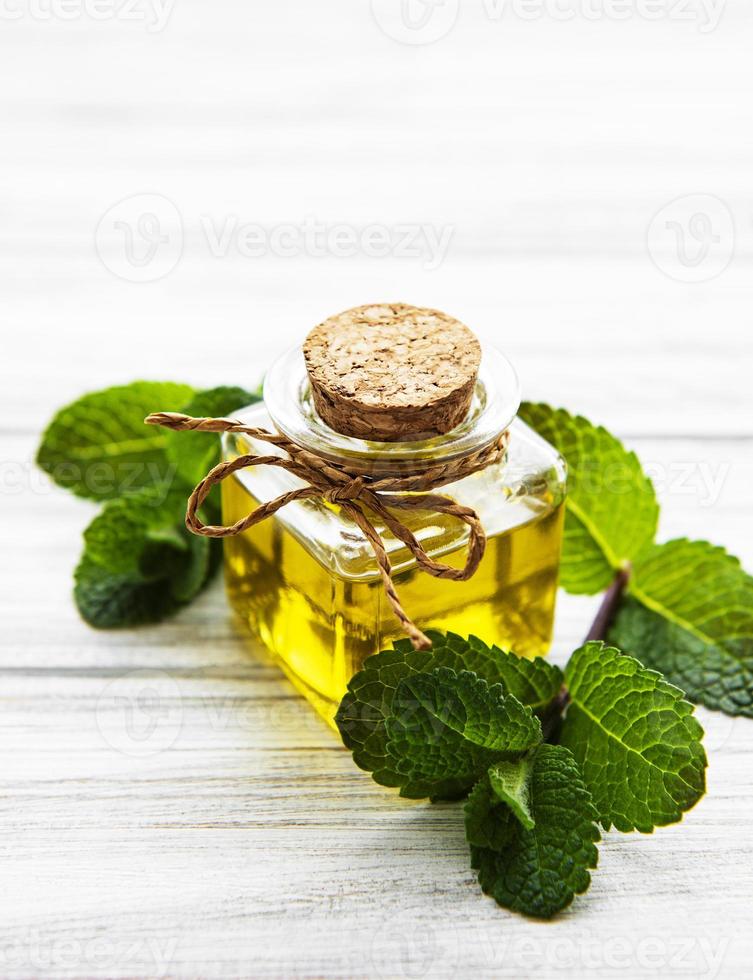 Essential aroma oil with mint photo