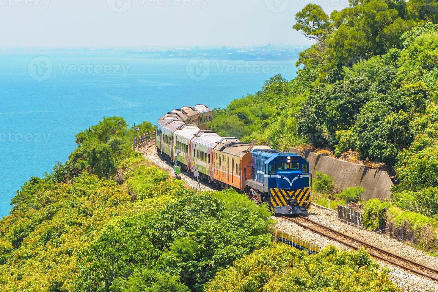 Scenery of Southern Taiwan with railway and train photo