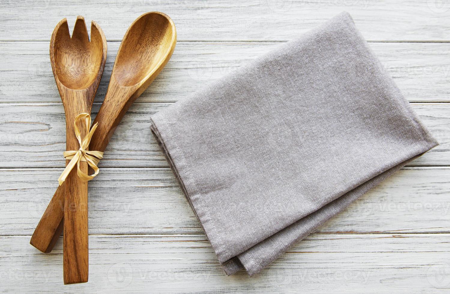 Two wooden salad spoons photo