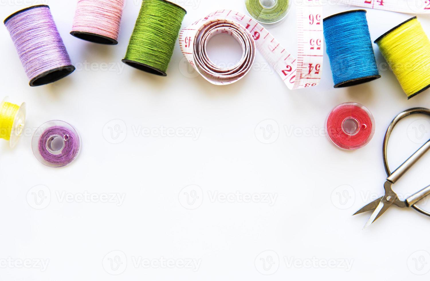 Sewing accessories on a white background photo