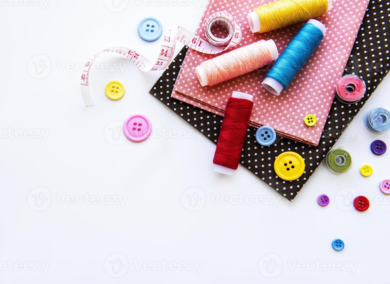 Sewing accessories on a white background photo