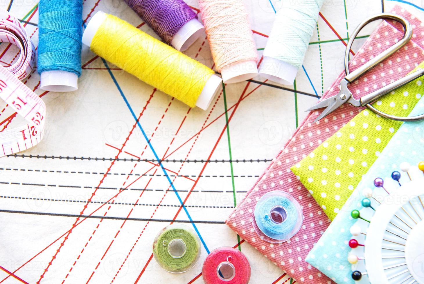 Sewing accessories on a white background photo