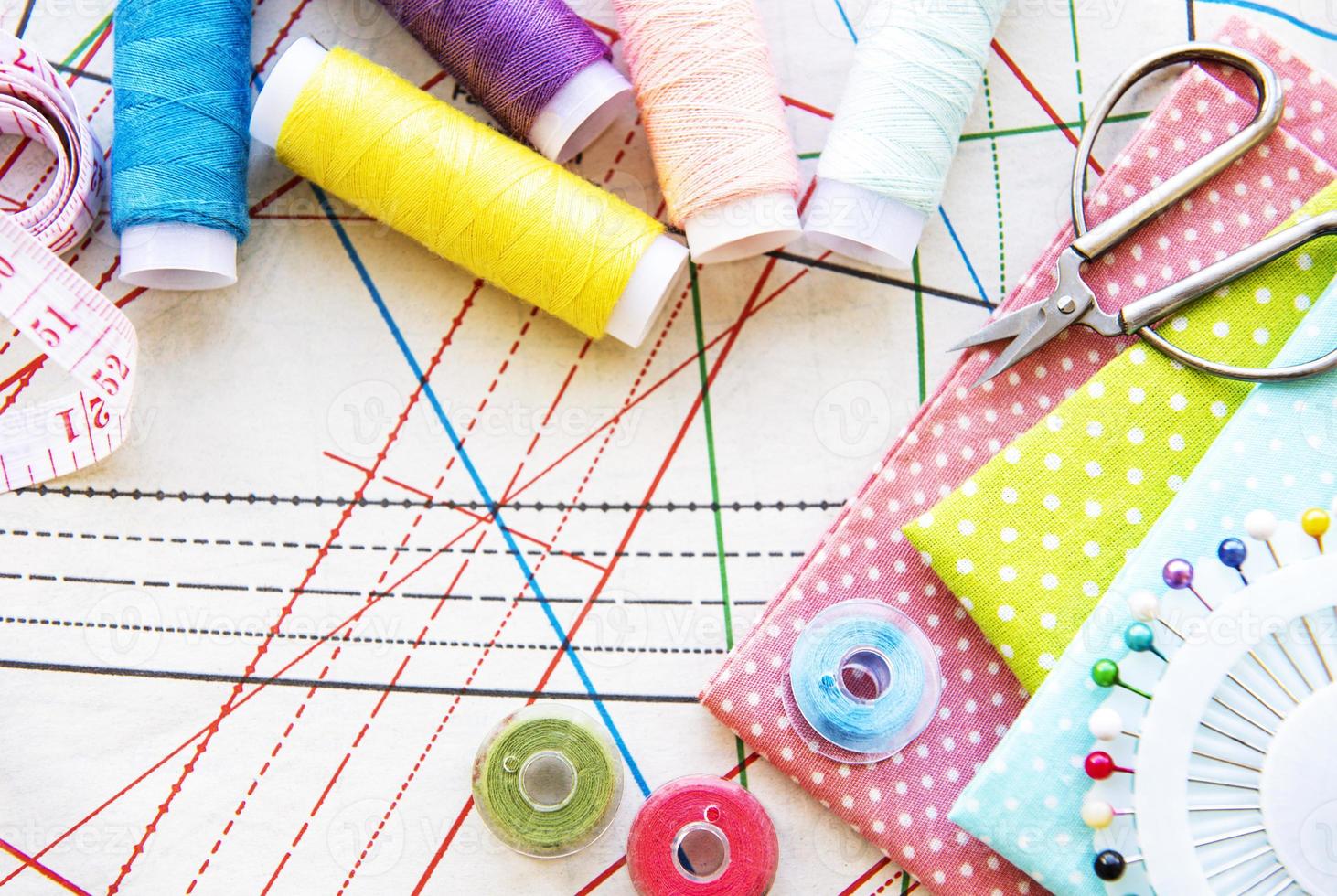 Sewing accessories on a white background photo