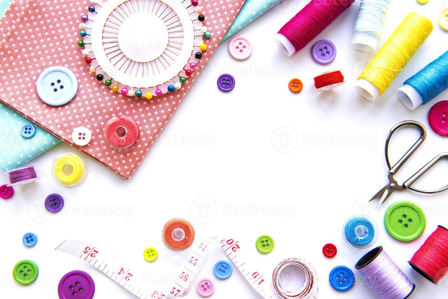 Sewing accessories on a white background photo