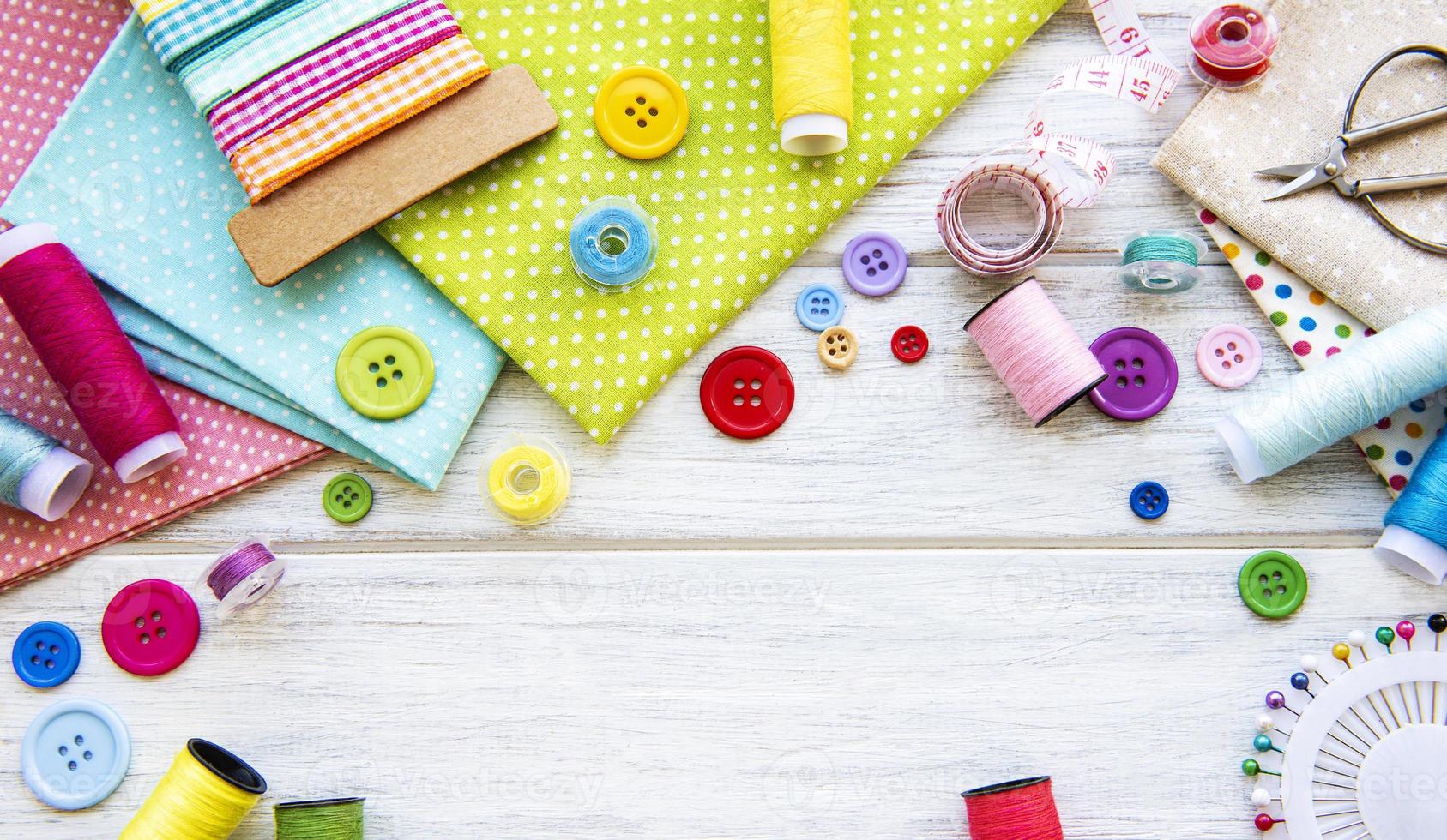 Sewing accessories on a white background photo