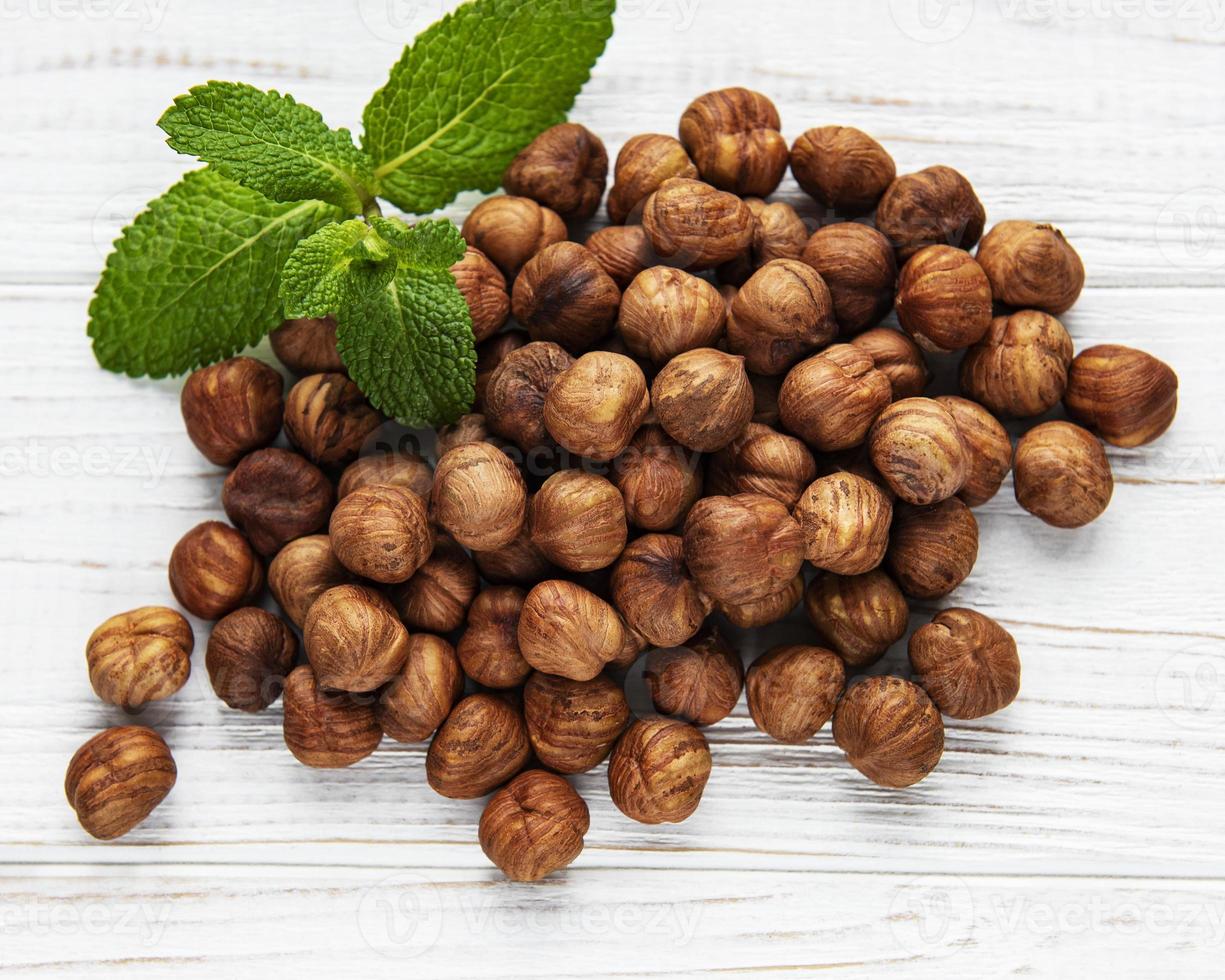 Peeled hazelnuts on a table photo