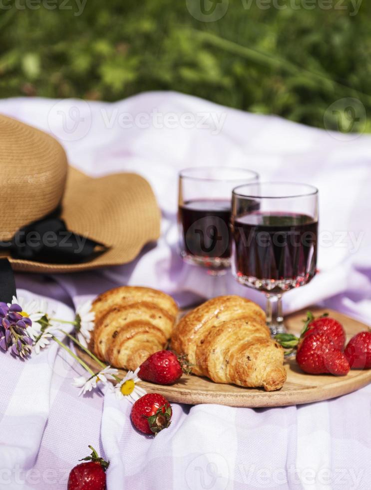 Romantic picnic scene on summer day photo