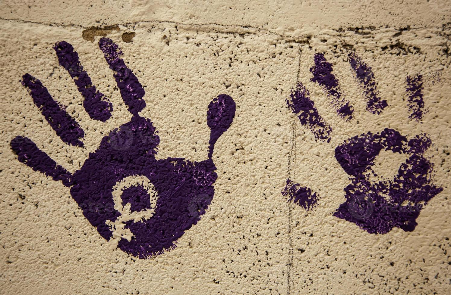 Feminist symbol on wall photo