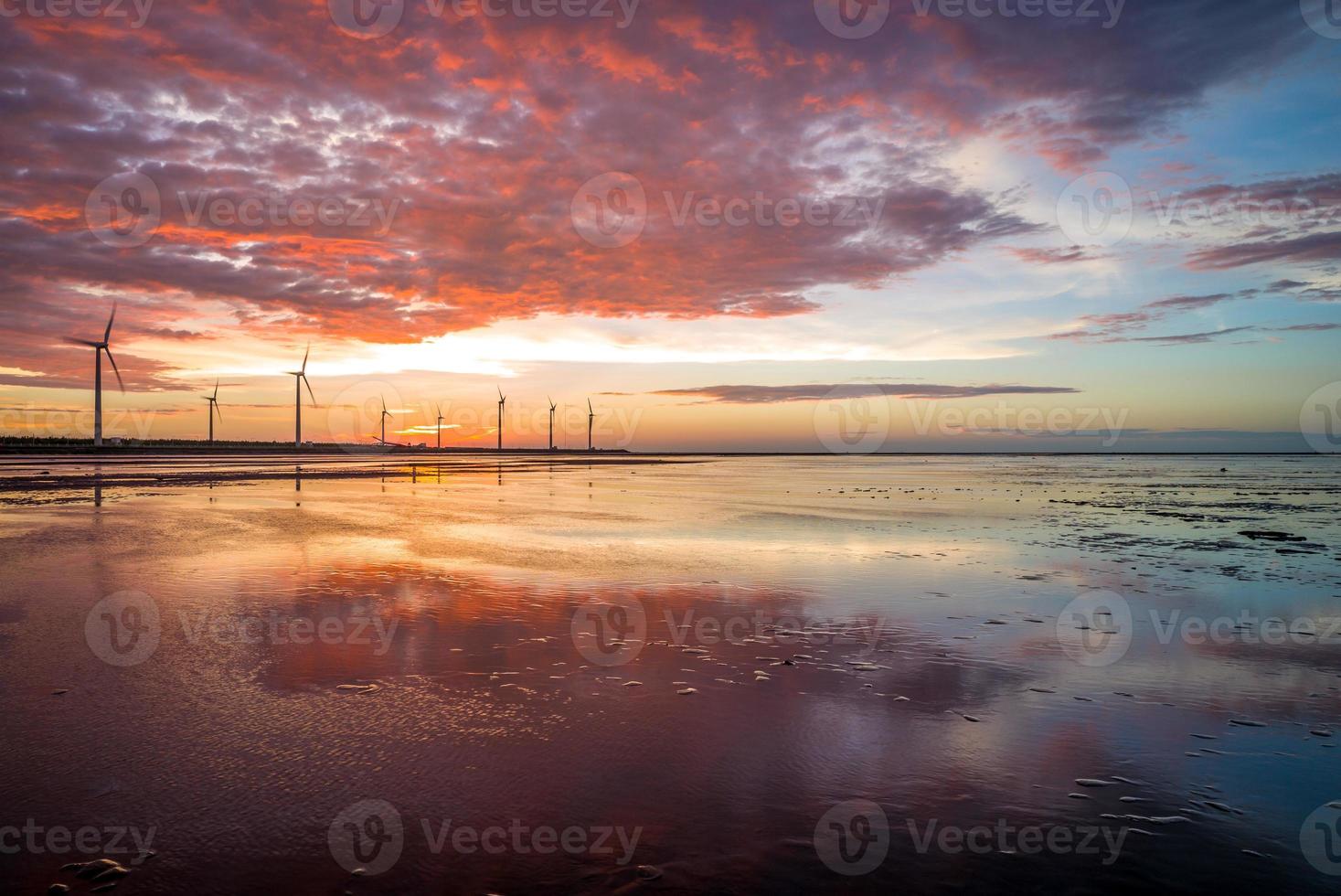 Sillouette of Wind turbine array at Gaomei Wetland, Taiwan photo