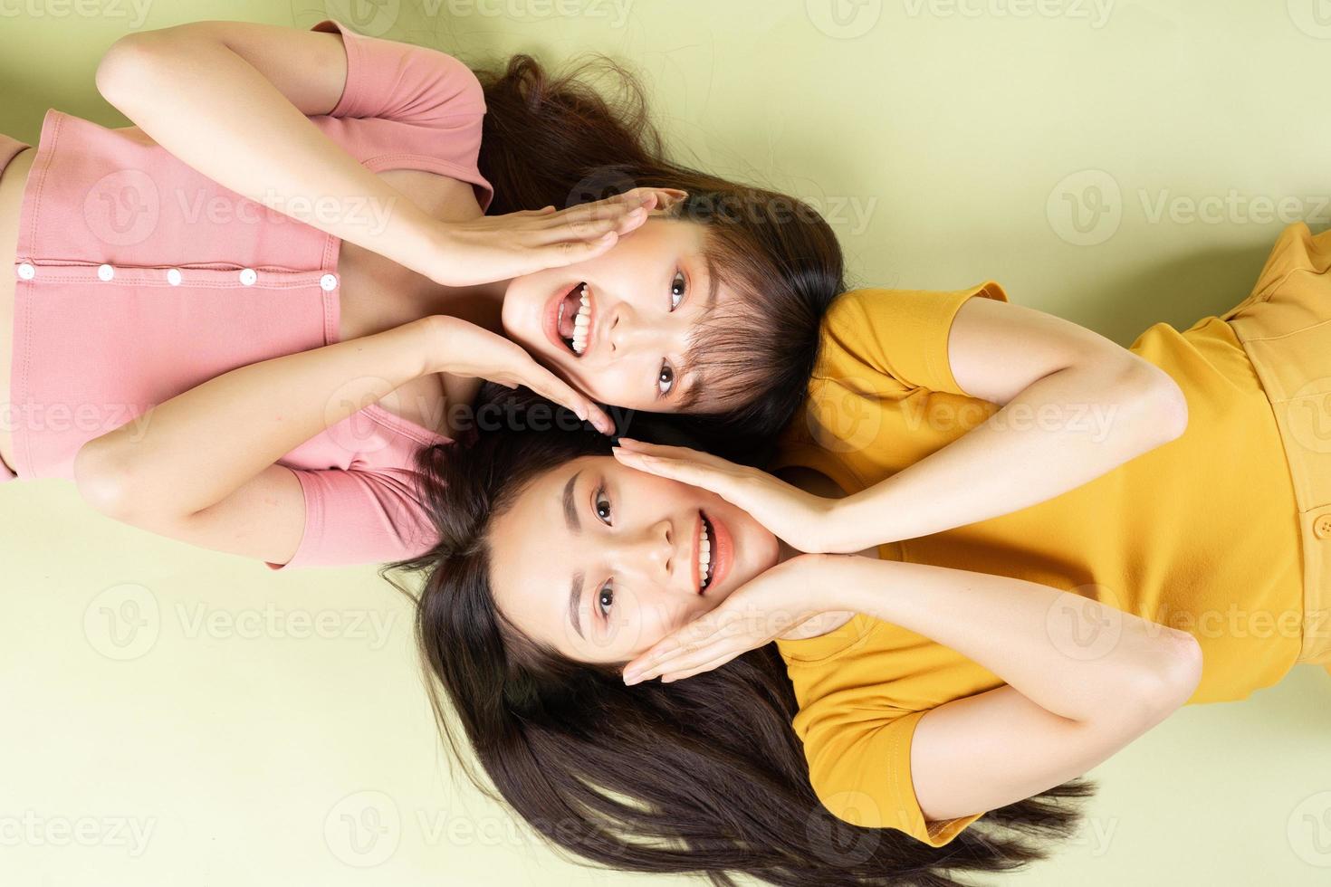 Portrait of two beautiful Asian girls photo